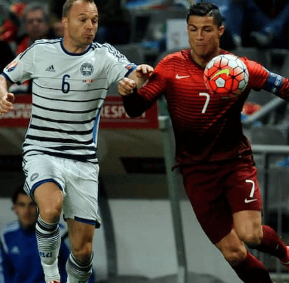 Lars Jacobsen and Cristiano Ronaldo