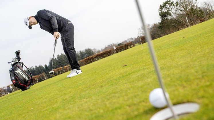 Magnus &Oslash;stergaard wearing Lexton Links on the course